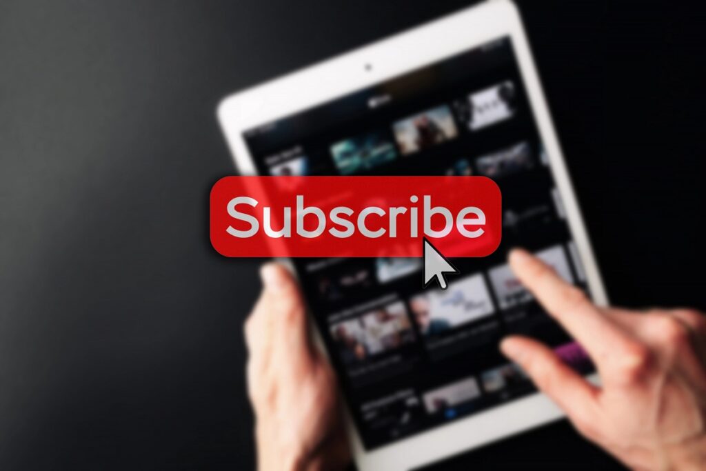 subscription service; red; subscription; service; button; video; online; internet; subscribe; arrow; computer; newsletter; tablet; blured; tv; laptop; movie; background; technology; digital; cursor; email; icon; like; vod; music; hand; hold; series; concept; person; software; marketing; stream; app; share; business; membership; home; channel; film; multimedia; hd; play; blur; svod; website; hulu; click; bell;